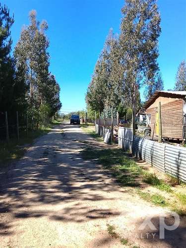 Parcela de 5.000 m con 4 cabañas y pozo en recinto privado