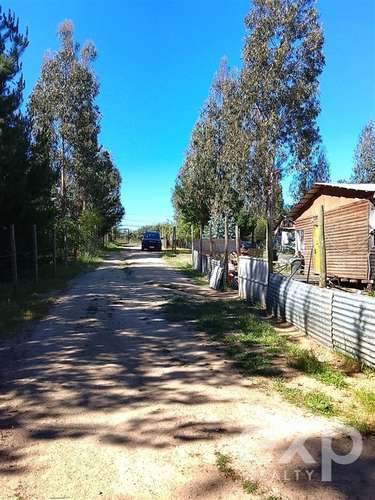 Parcela de 5.000 m2 con 4 cabañas y pozo en recinto privado