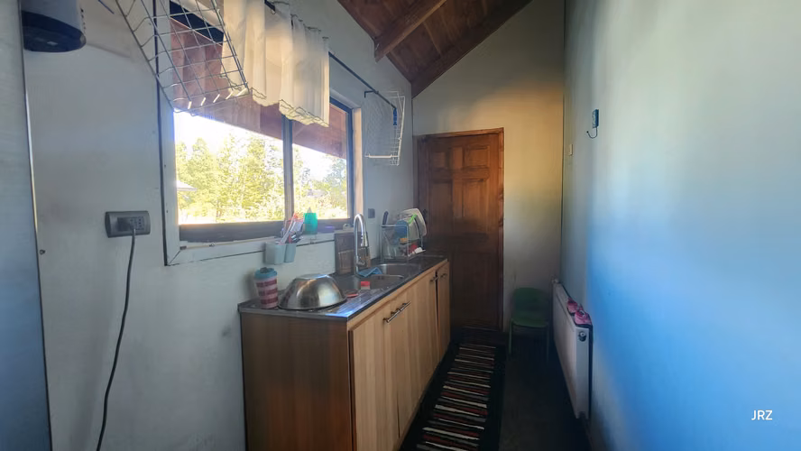 MODERNA CASA CON GRAN QUINCHO TERRENO DE 6800M2