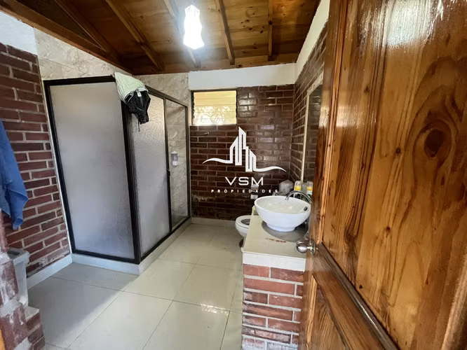 Oportunidad se Vende parcela, con gran quincho, piscina y paltos en produccion