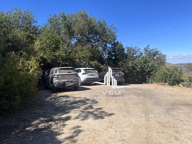 Oportunidad se Vende parcela, con gran quincho, piscina y paltos en produccion