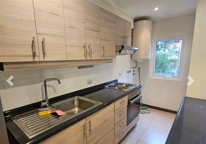 Departamento en condominio piso 1 con gran jardín