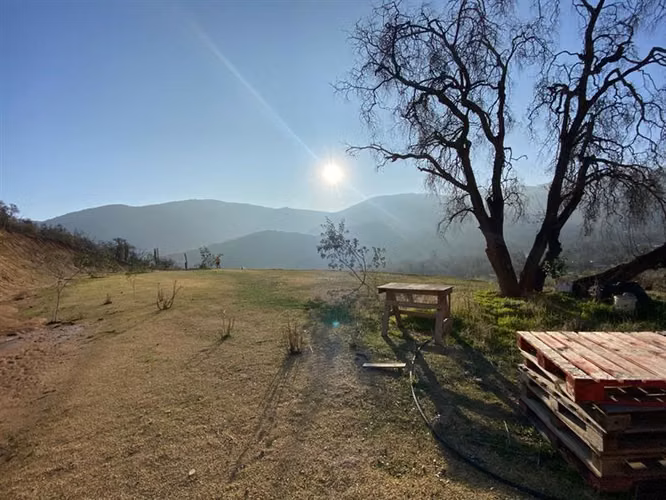 HERMOSO SITIO EN CURACAVI SEMI PLANO CERCADO Y CON MESETA