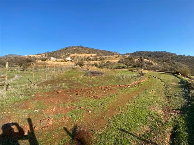 HERMOSO SITIO EN CURACAVI SEMI PLANO CERCADO Y CON MESETA