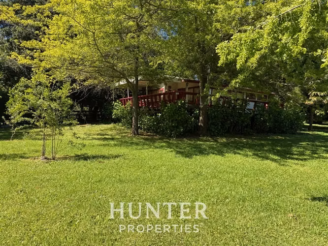 Sitio de 5 mil m2 y 3 casas, 2 piscin en colbun lado norte