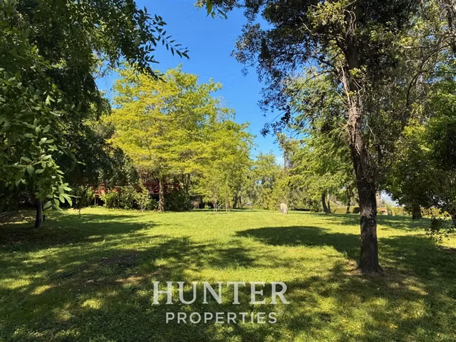 Terreno de 5.000 m2 y 3 casas, piscina en colbun lado norte