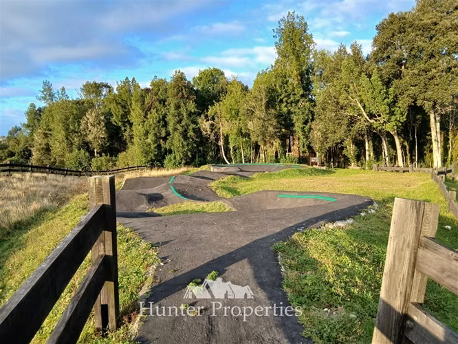 Parcela con vista volcanes y bosque en venta en Puerto Varas