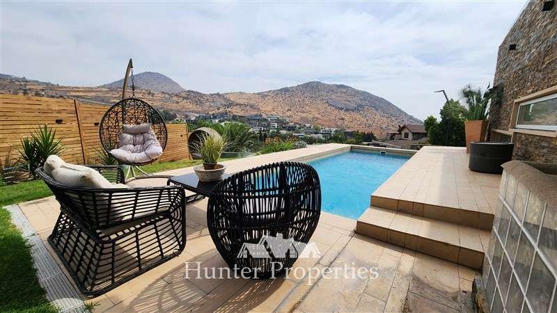 Casa en venta de 5D y 5B en Cond La Reserva. Colina