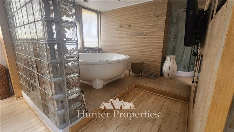 Venta de parcela con casa 5D y 5B en Cond La Reserva. Colina