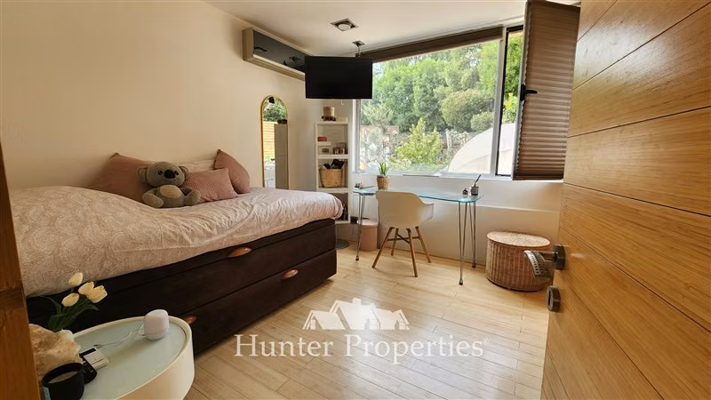 Venta de parcela con casa 5D y 5B en Cond La Reserva. Colina
