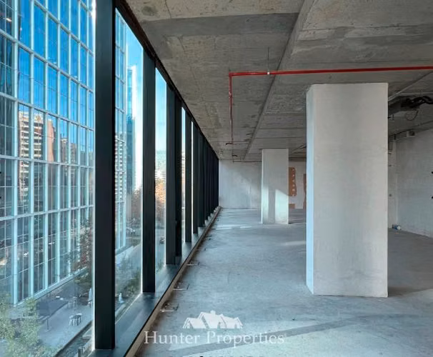 Oficina Planta Libre en arriendo Nueva Las Condes - Imagen 14