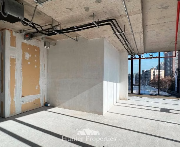 Oficina Planta Libre en arriendo Nueva Las Condes - Imagen 24