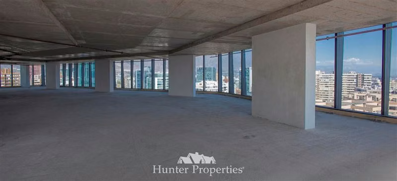 Oficina Planta Libre en arriendo Nueva Las Condes - Imagen 9