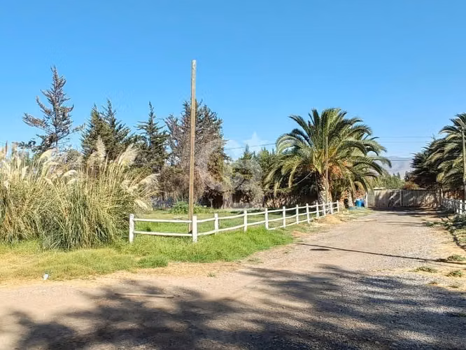 Parcela con dos casas en el Taqueral - Lampa