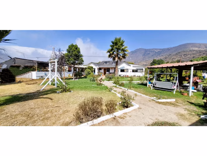 Venta parcela de 18.000 m2., casa, cabaña y galpón, con maquinaria de maestranza, en La Calera. 21.308 UF.