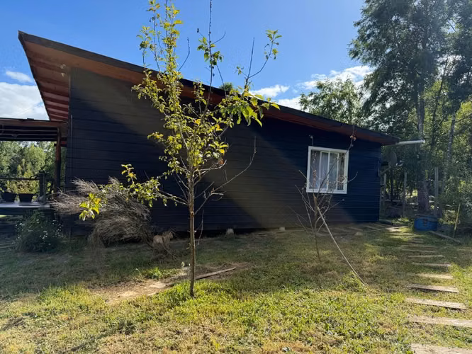 Parcela con cabaña en venta