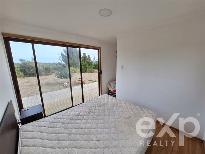 Vende Terreno 5000m2 con casa 78m2 en Pichilemu