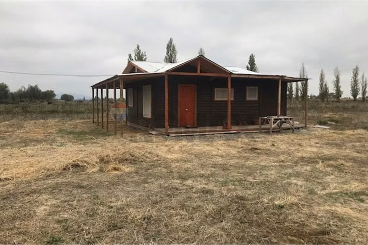 Parcela 5.100 m² con casa en el huique