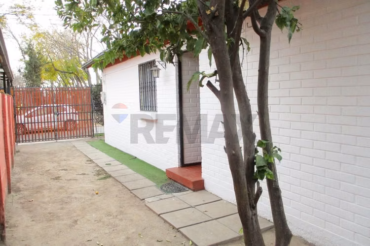 Encantadora casa en puente alto / villa la foresta