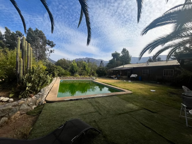 PARCELA CON CASA Y ARBOLES FRUTALES 5600MTS - Imagen 1