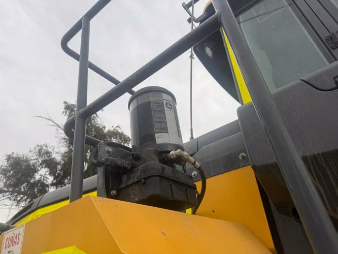 Cargador frontal Jhon Deere unicornio dueño