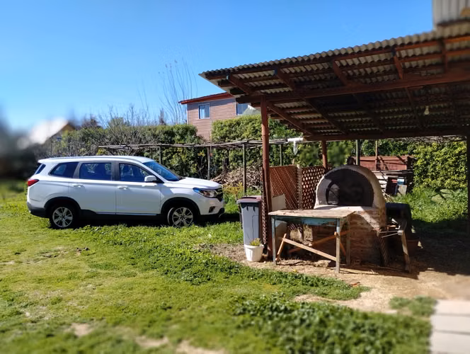 Parcela en el Monte con Casa y Estacionamiento techado