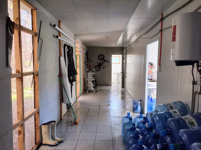 Parcela 5.000 m² con casa y planta purificadora de agua operativa — Catripulli, Curarrehue