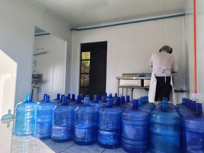 Parcela 5.000 m² con casa y planta purificadora de agua operativa — Catripulli, Curarrehue