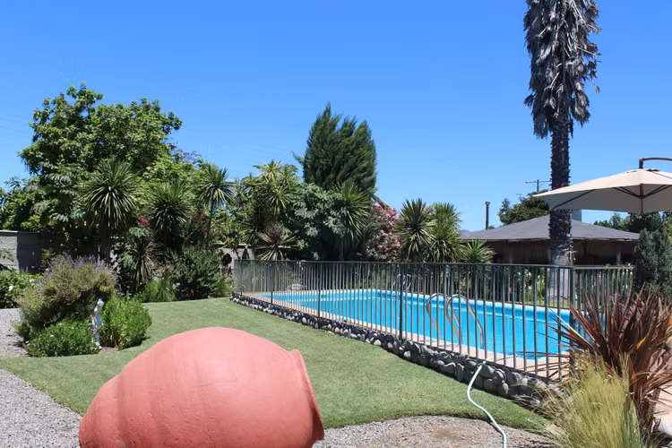 REBAJADA HERMOSA CASA DE 200 M2 EN TERRENO 2400 M2 EN PEUMO