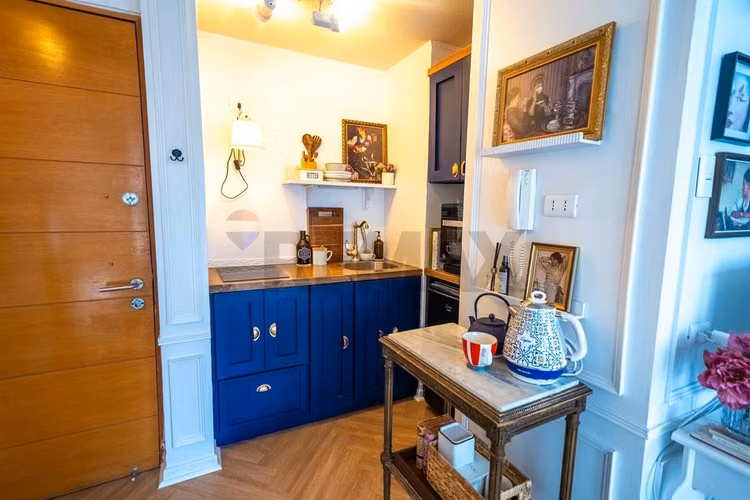 Departamento remodelado de estilo parisino - Imagen 8