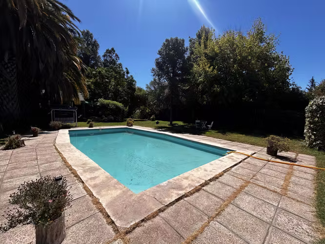 PARCELA CON PISCINA Y JARDÍN PRODUCTIVO A 45 MIN DE SANTIAGO