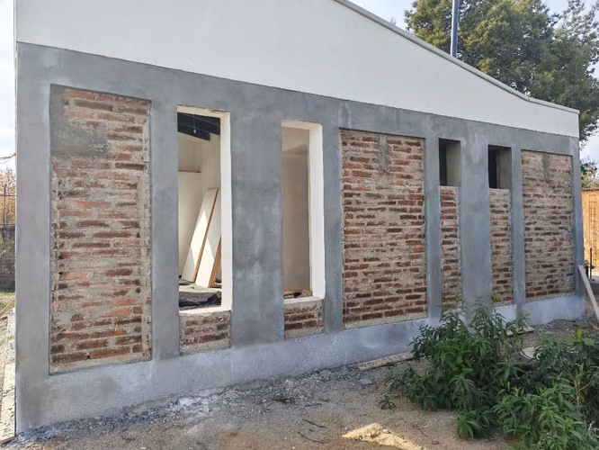 Terreno con obra gruesa