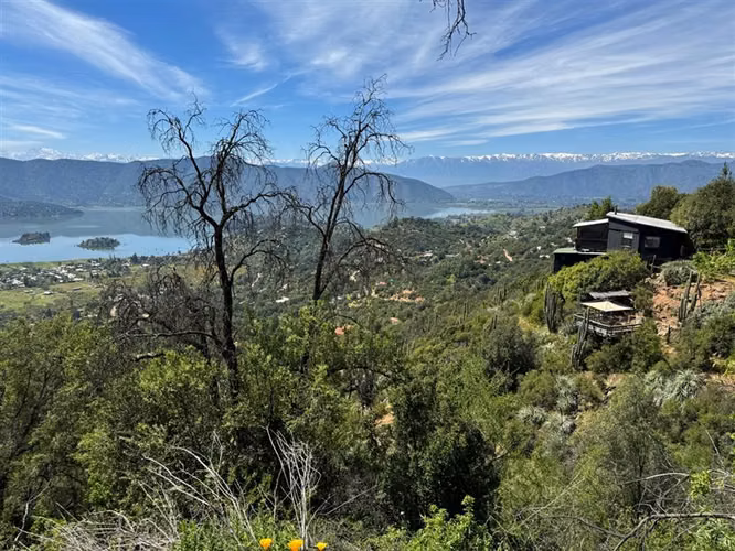 PARCELA CON MARAVILLOSA VISTA LAGUNA ACULEO EN CONDOMINIO