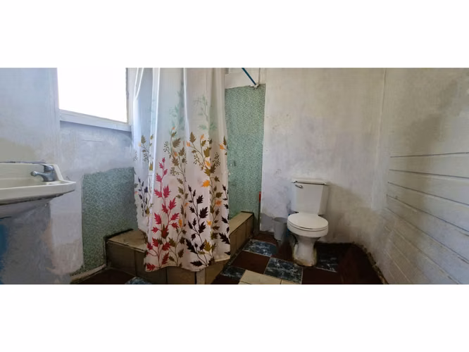 Venta de sitio de 1.300 m2., con 2 casas y una cabaña, en Olmué. 102 M$