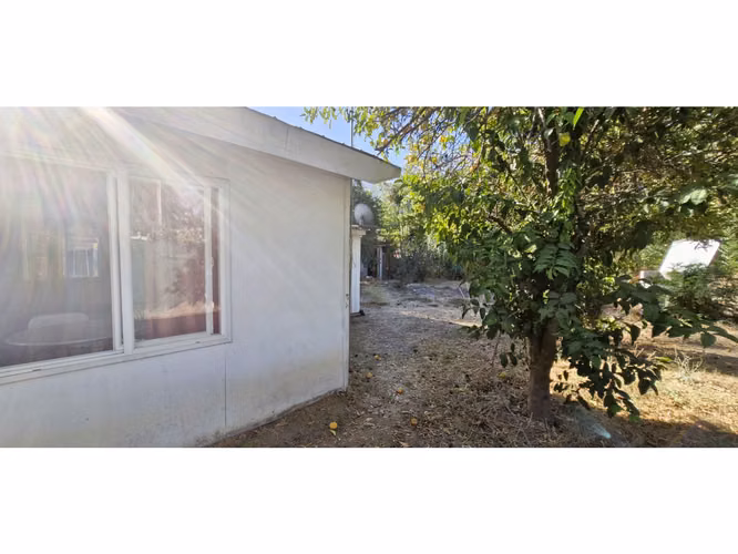 Venta de sitio de 1.300 m2., con 2 casas y una cabaña, en Olmué. 102 M$