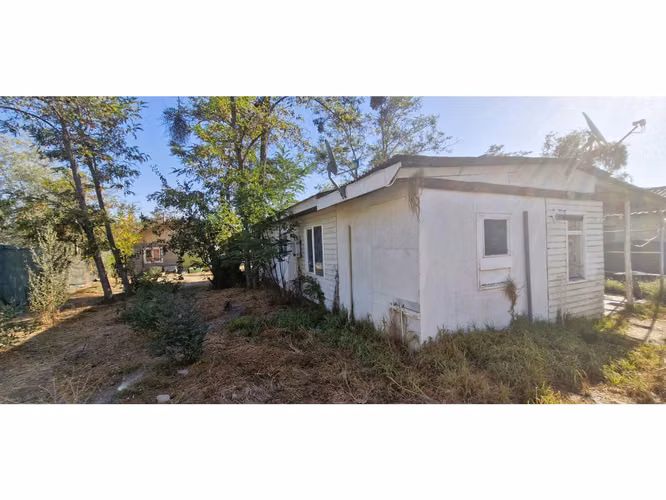 Venta de sitio de 1.300 m2., con 2 casas y una cabaña, en Olmué. 102 M$
