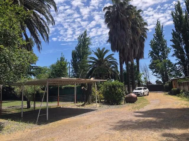 Hermosa Parcela con dos casas y bodegas en 4 hectarea en Rengo