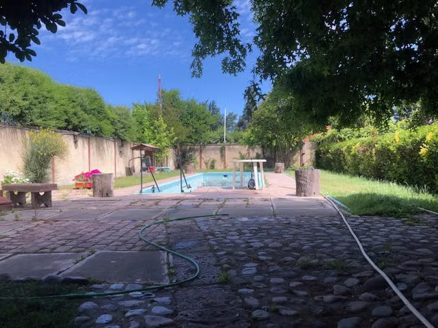 Hermosa Parcela con dos casas y bodegas en 4 hectarea en Rengo