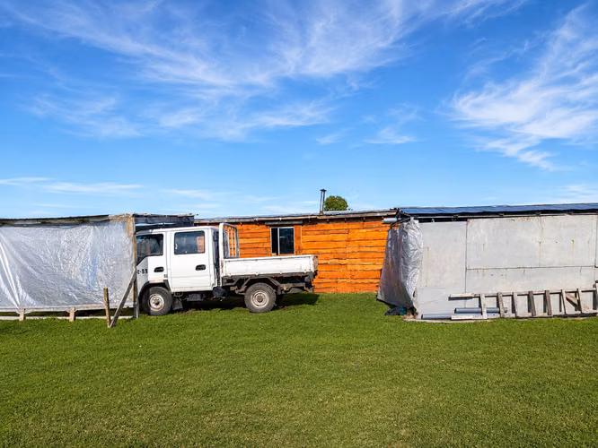 PARCELA PLANA 5000MTS FRUTILLAR CON CONSTRUCCIÓN DE MADERA