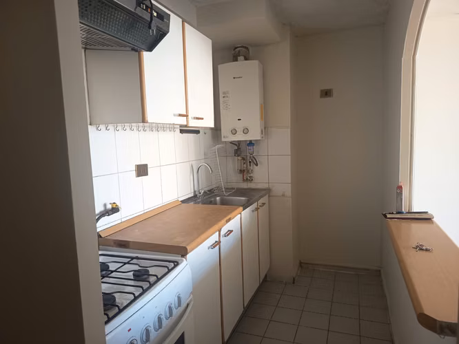 Arriendo 2D/2B Santiago Centro: Seguridad y Conectividad a pasos de La Moneda - Imagen 3