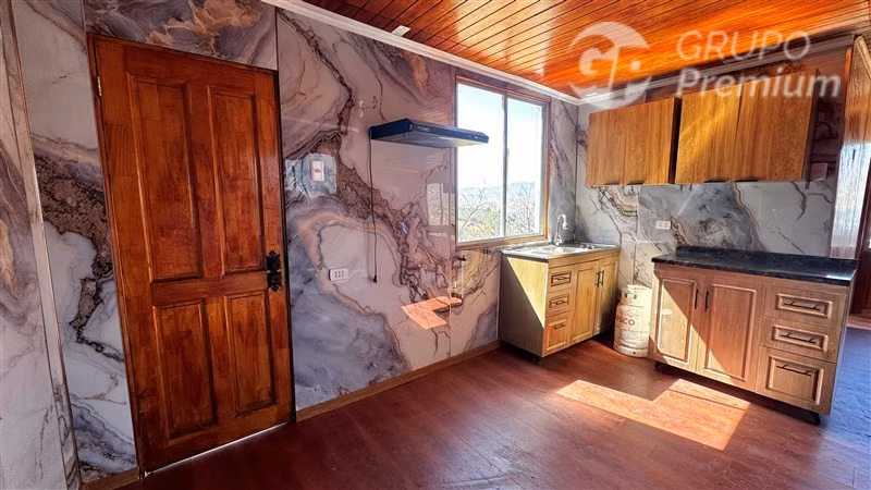 PARCELA CON CASA EN SECTOR RESIDENCIAL DE CURACAVI