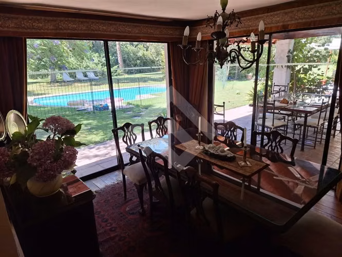 Parcela con amplia casa en venta en Buin, ERZ