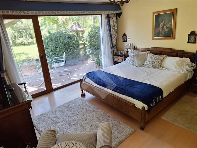Parcela con amplia casa en venta en Buin, ERZ