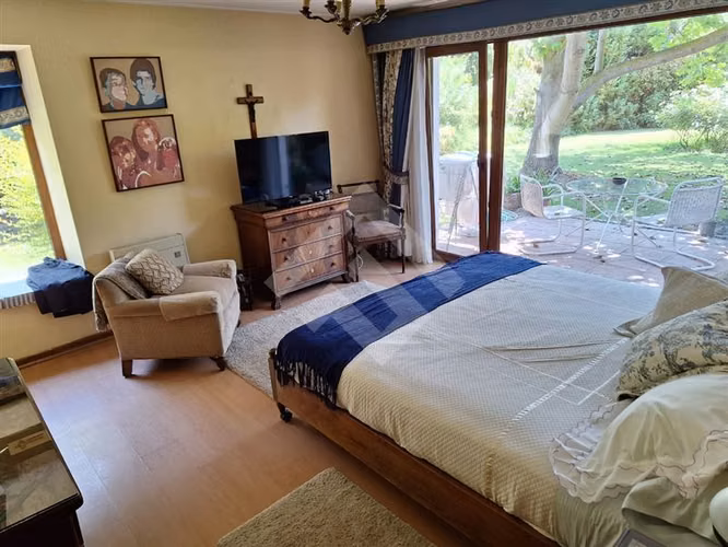 Parcela con amplia casa en venta en Buin, ERZ