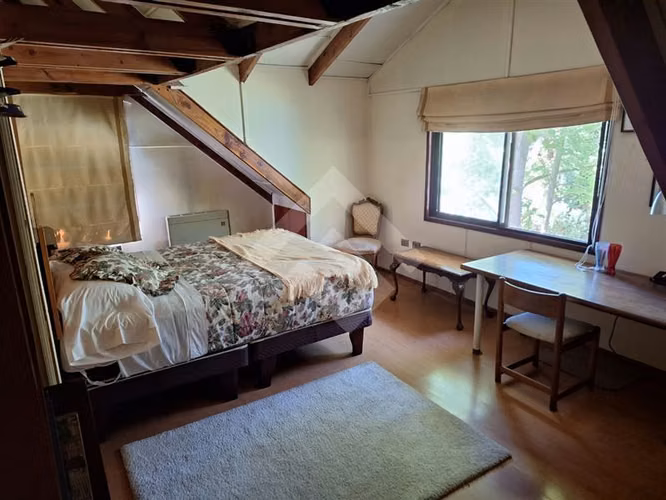 Parcela con amplia casa en venta en Buin, ERZ