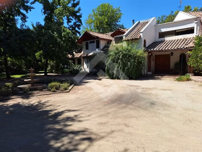 Parcela con amplia casa en venta en Buin, ERZ