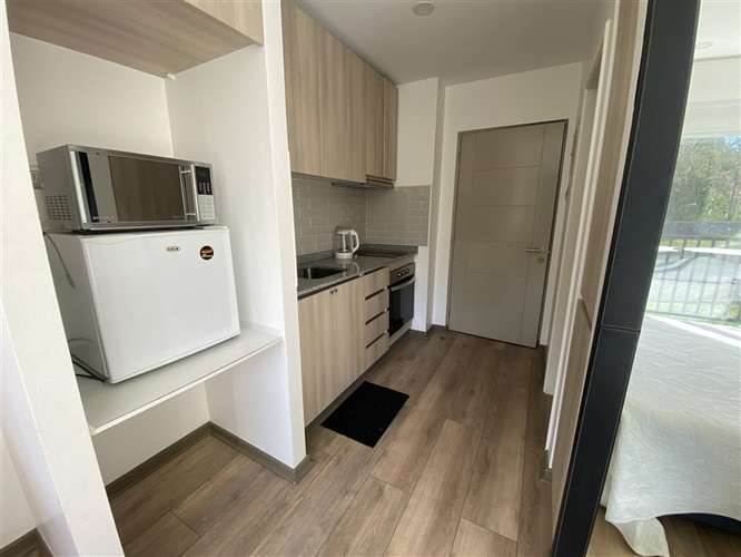 VENTA ACOGEDOR DEPARTAMENTO ESTUDIO EN PUCÓN. INVIERTE - Imagen 9