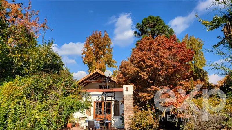 ESPECTACULAR PARCELA CON CASA COLONIAL SECTOR EL BOSQUE