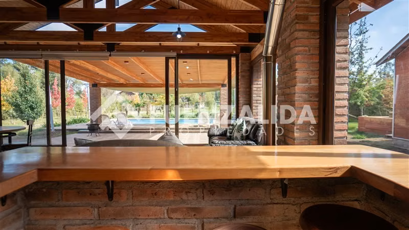 Parcela con casa 2d 2b mas piscina quincho