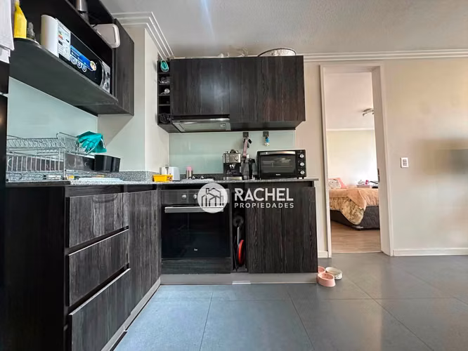 SE ARRIENDA AMPLIO DEPARTAMENTO DE 1 DORMITORIO CON ESTACIONAMIENTO